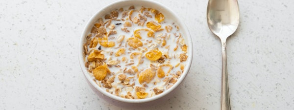 Milk and cereal with spoon